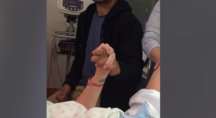 The father’s humorous reaction to his partner’s birth has gone viral.