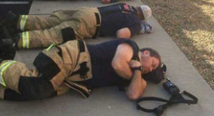 Man snaps heartbreaking photo of firefighters taking a rest after 24 hours of working nonstop