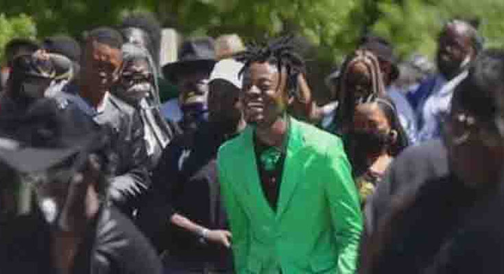 Son Arrives at Dad’s Funeral in Bright Suit Smiling, Priest Stops the Ceremony